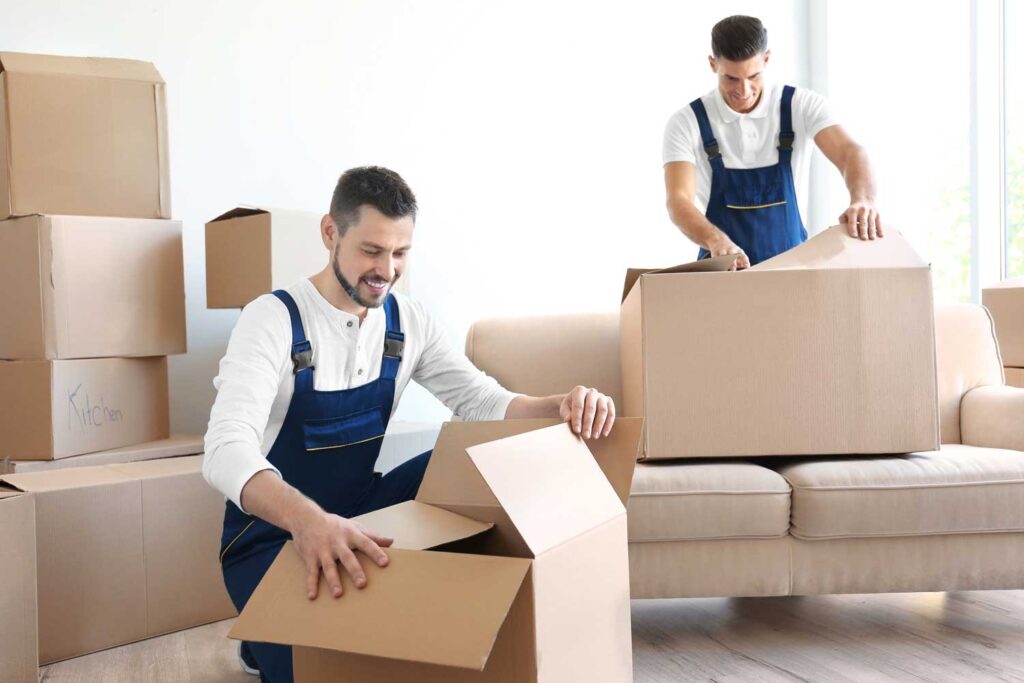 delivery-men-moving-boxes-room-new